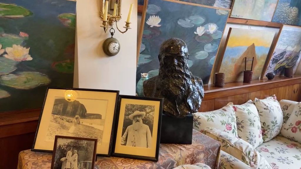 replicas of painting and a photo of Monet