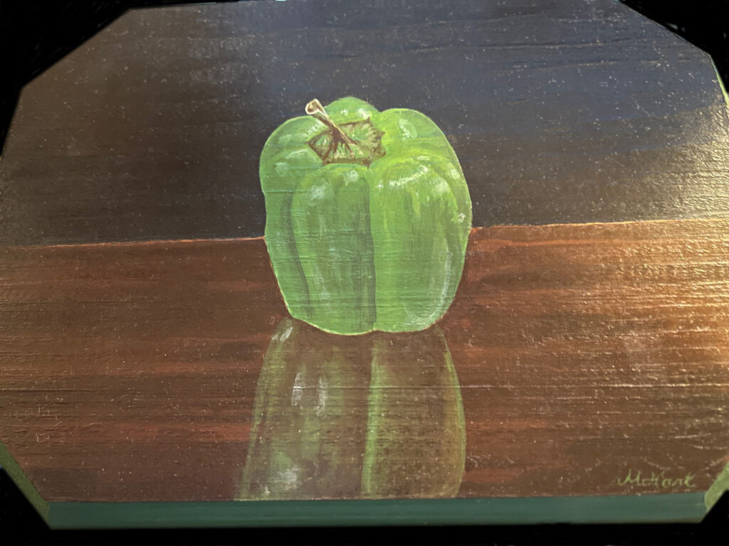Acrylic painting of a green pepper on a wood plaque